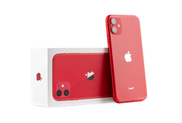 Rostov-on-Don, Russia - November 2019. Apple iPhone 11 PRODUCT RED on a white background.  Close-up of a new smartphone from Apple and a box from it.